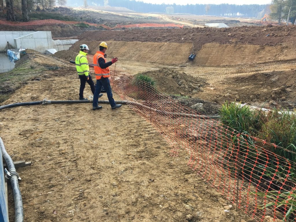 Large construction site with exposed soils and silt