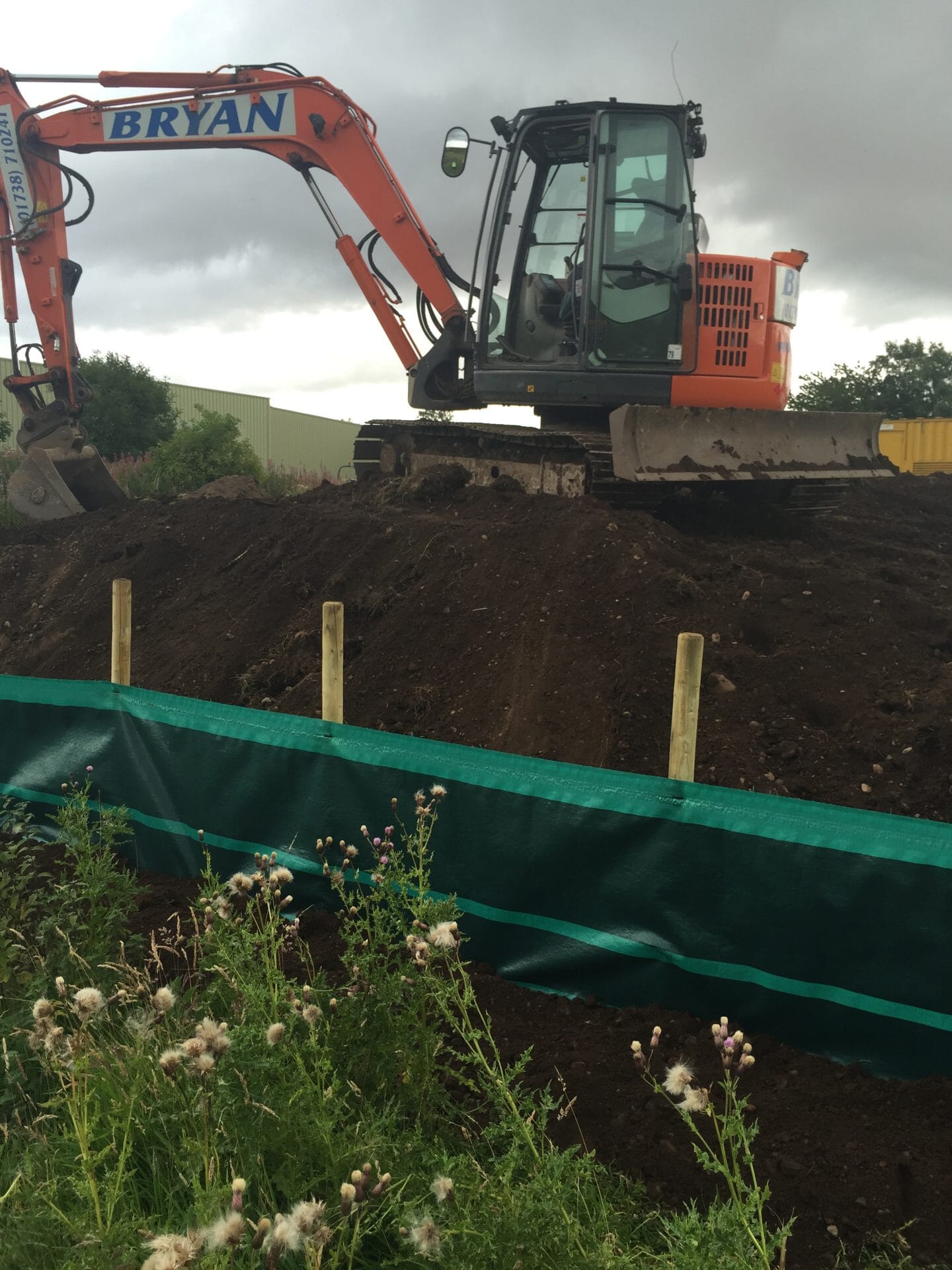 Silt fence holding back silt pollution