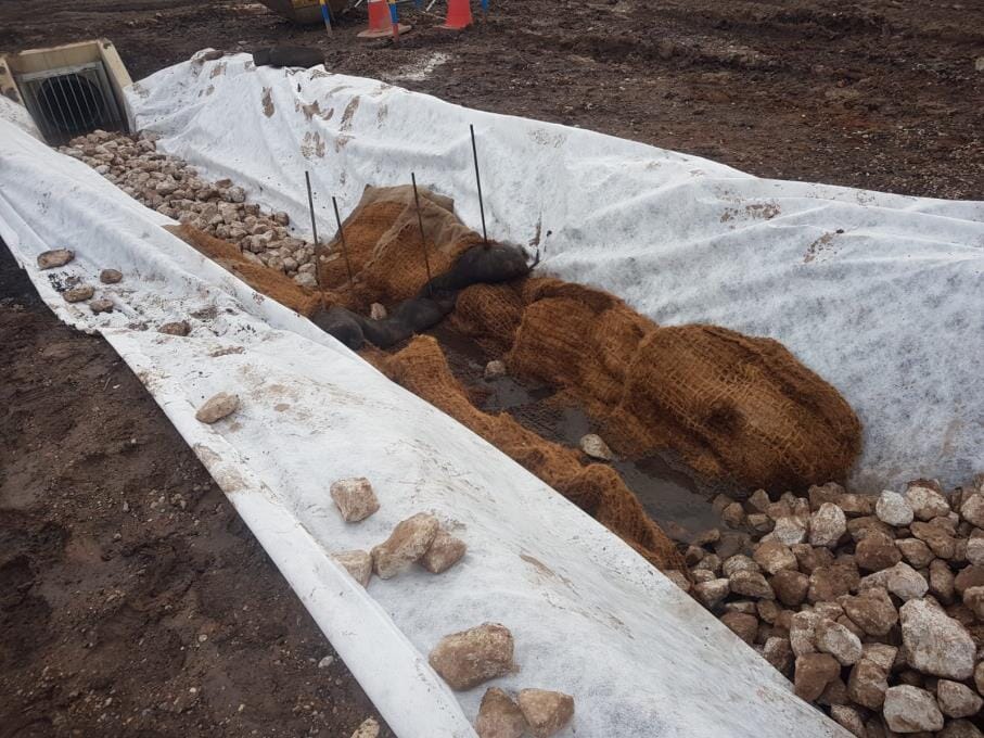 Lined-ditch-with-frog-silt-management-products