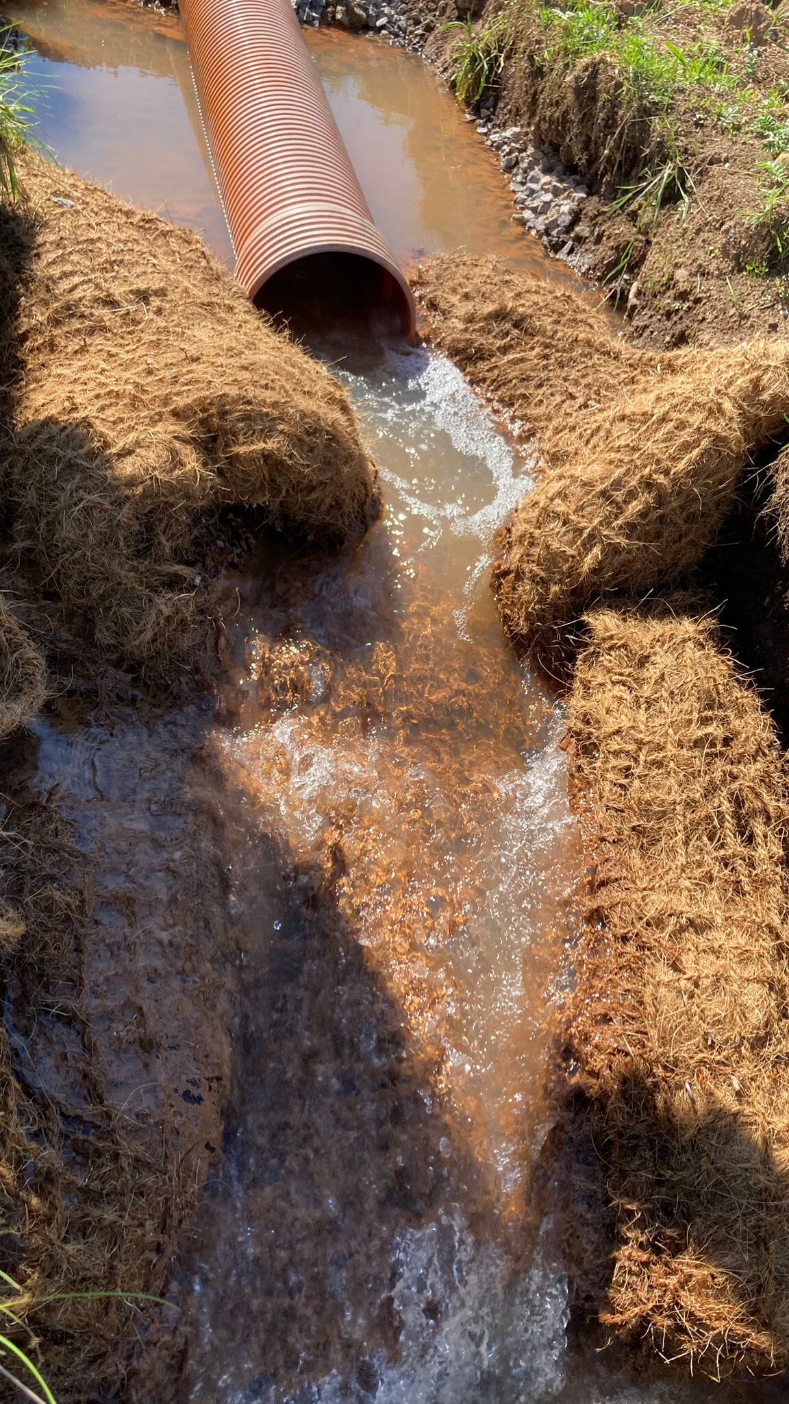 Water-flowing-through-Floc-MatsTM